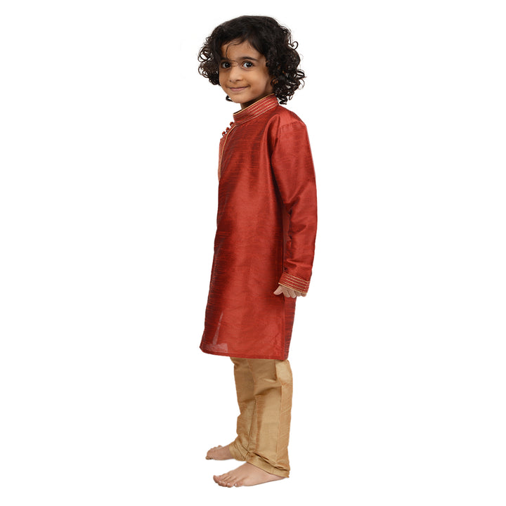 Red Art Silk Kids Kurta Set - Maharaja side profile highlighting the kurta's rich texture and traditional design for boys' ethnic fashion.