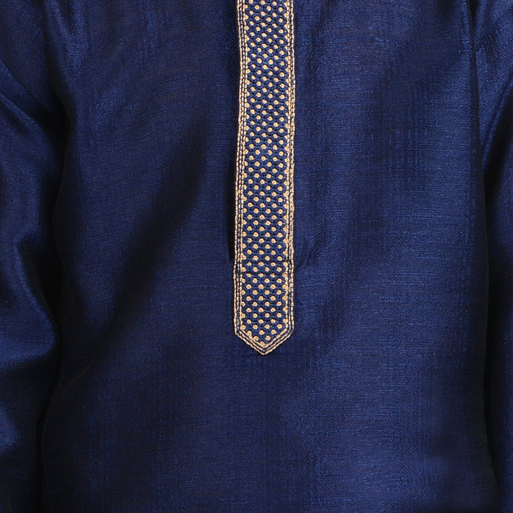 Close-up of embroidery on Art Silk Embroidered Kurta - Kids Gold Kurta Set showing intricate gold detailing on blue silk fabric.