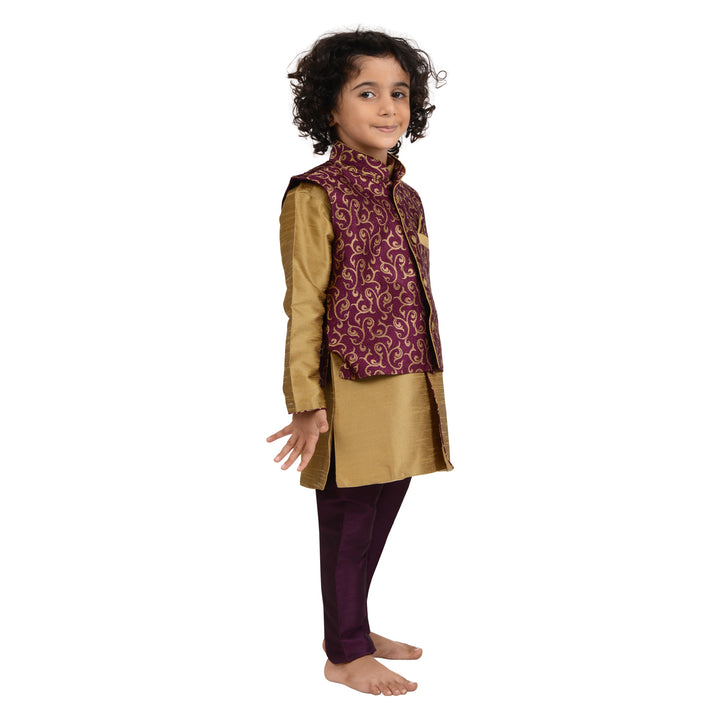 Traditional boys kurta set in art silk with purple brocade jacket and golden kurta, perfect for festive and ceremonial wear.