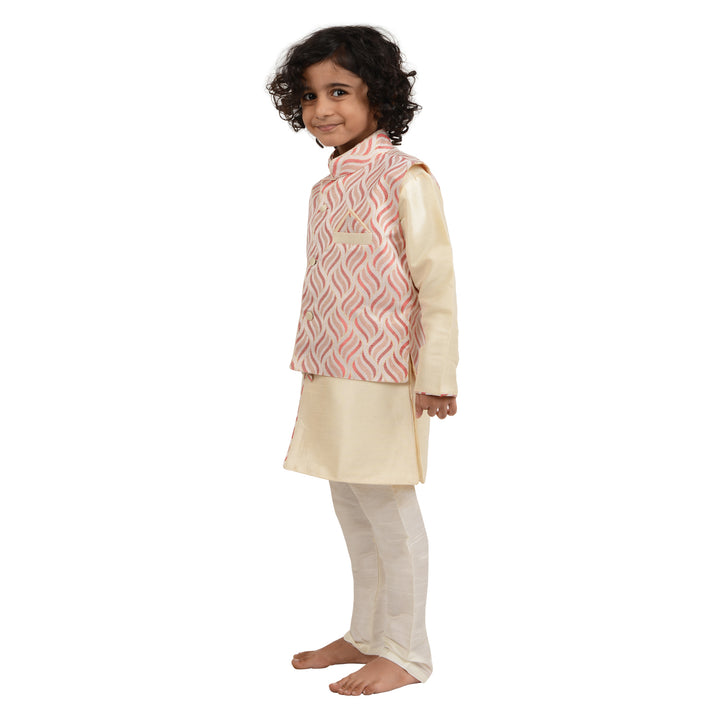 Side view of Boys Kurta Set with cream art silk kurta and red embroidered jacket, showcasing breathable fabric and elegant traditional design.
