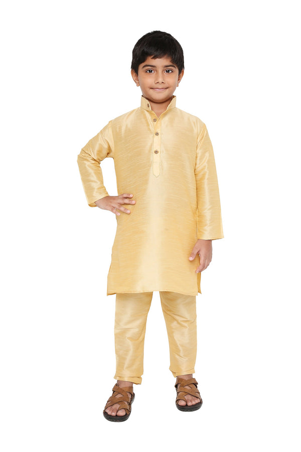 Maharaja Kids Kurta Pyjama Set in beige art silk for boys, featuring a traditional design with long sleeves and buttoned neckline.