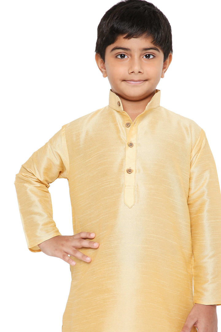 Close-up of beige Banaras art silk kurta from Maharaja Kids Kurta Pyjama Set, showcasing fine texture and button detailing.