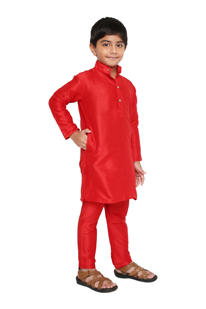 Side pose of Kids Red Art Silk Kurta Set - Banarasi Style highlighting comfortable fit and elegant silhouette for boys.