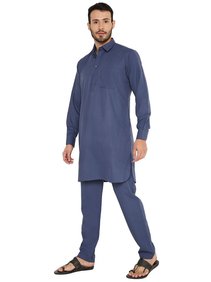 Blue wrinkle-free Pathani set made from easy-care poly blend fabric, styled with a collared kurta and relaxed-fit trousers.