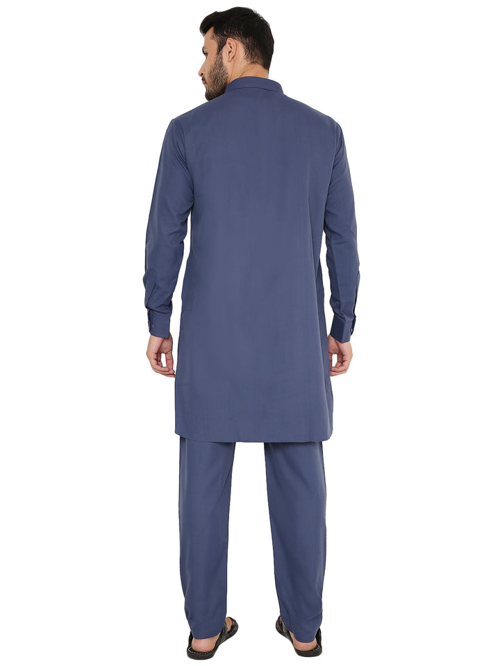 Back view of the wrinkle-free blue Pathani set, highlighting the smooth finish and straight-cut silhouette of the kurta and pants.