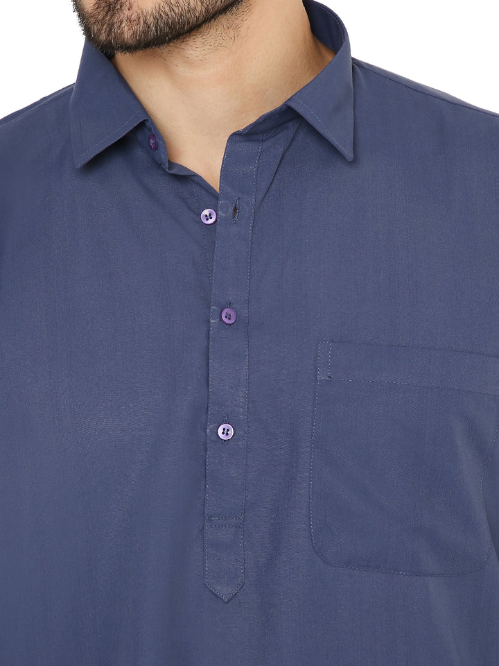 Close-up of the blue wrinkle-free Pathani kurta's button placket and chest pocket, crafted from soft poly blend fabric for easy care.