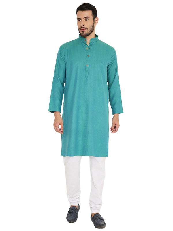 Green Linen Kurta - Pure Linen Elegance with minimal prints, styled with white churidar for traditional and casual wear.