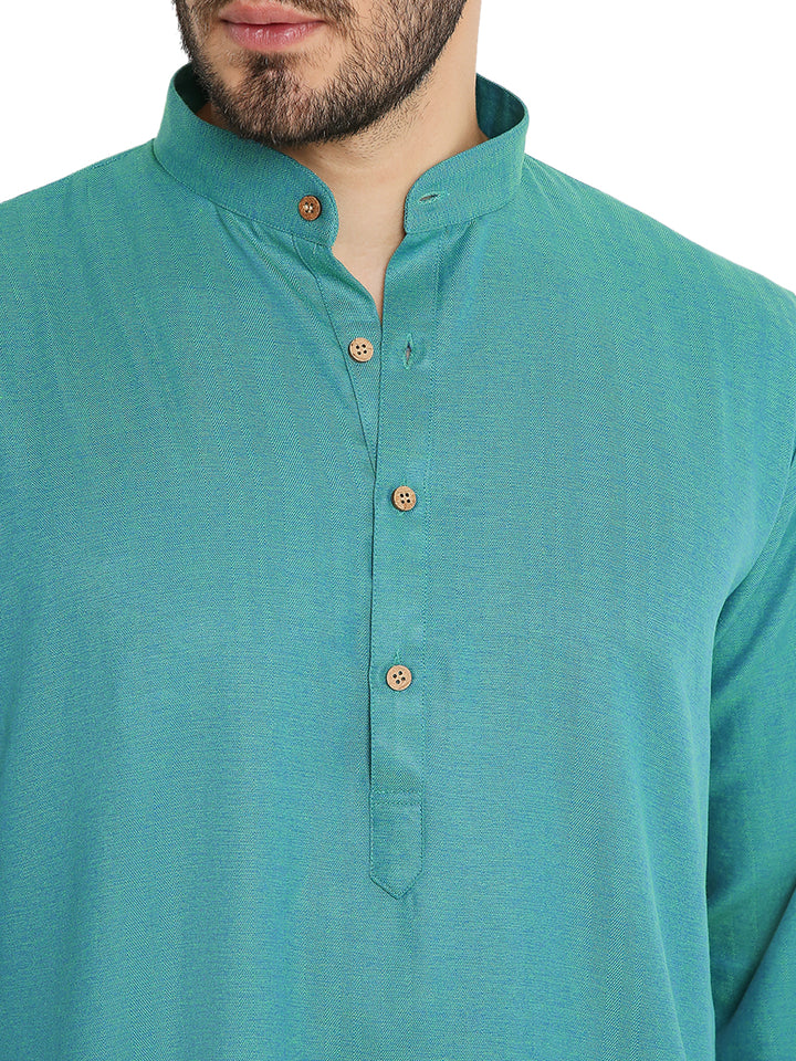 Close-up of Green Linen Kurta's wooden button placket and mandarin collar, highlighting fine craftsmanship and minimal design.
