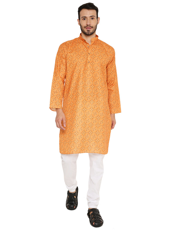 Orange Linen Kurta with traditional print, ideal for festive wear. Lightweight ethnic kurta set paired with white churidar for cultural events.