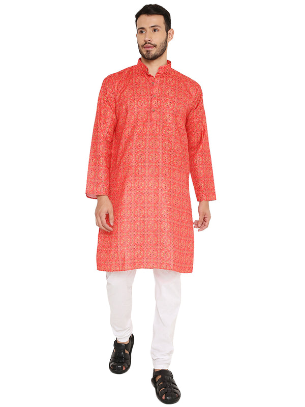 Red linen kurta with traditional floral print, styled with white churidar. Breathable ethnic wear ideal for festive occasions.