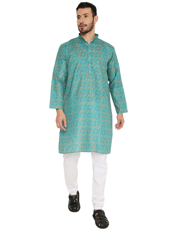 Green linen kurta with traditional print, styled with white churidar pants. Lightweight and breathable for festive occasions.