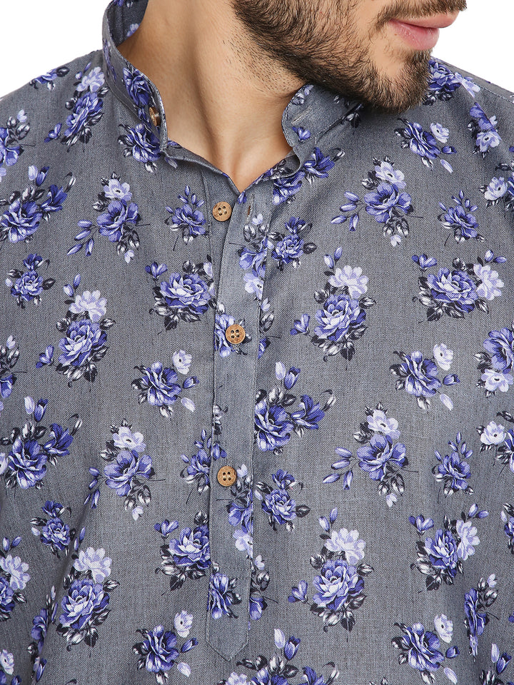 Close-up of floral print and wooden buttons on dark grey linen kurta, highlighting breathable fabric and fine detailing.