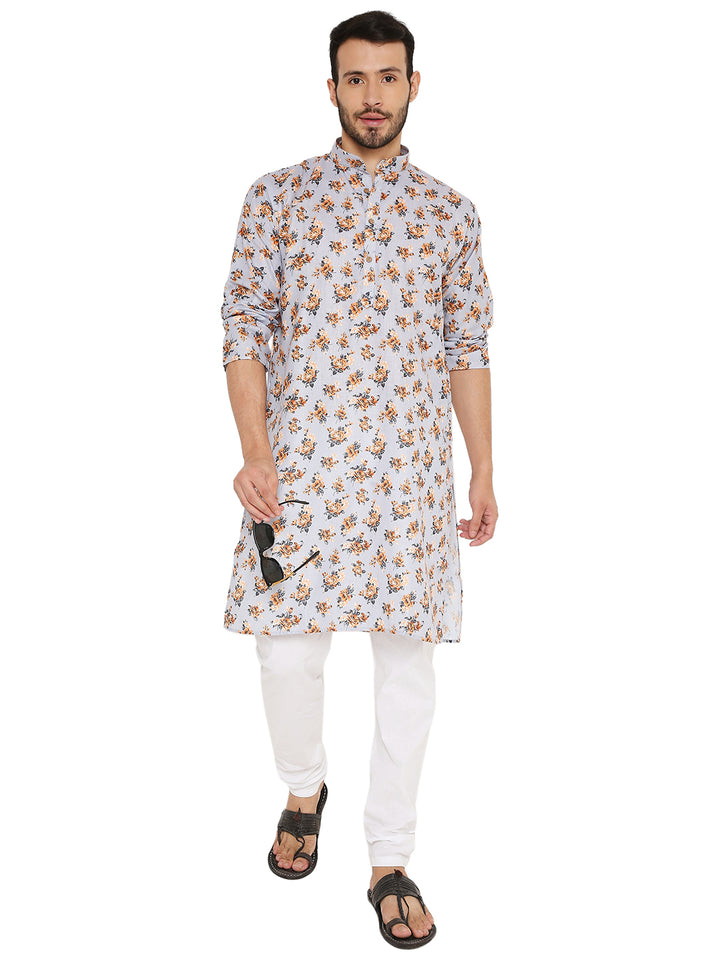 Light grey floral linen kurta styled with sunglasses and sandals, offering a modern twist to classic ethnic fashion.