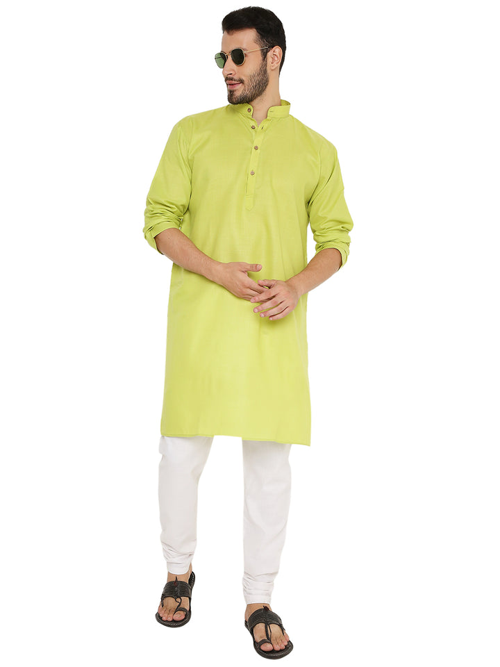 Green Cotton Maharaja Kurta styled with rolled sleeves and sunglasses, highlighting its modern versatility and relaxed fit.