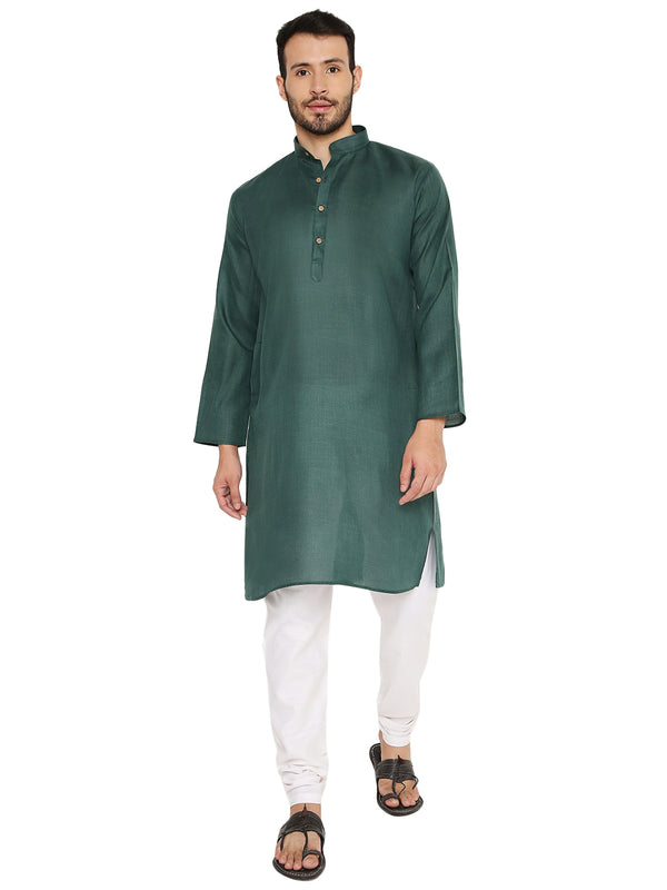 Magic Cotton Kurta in green with a comfortable fit, styled with white churidar pants. Ideal for traditional and casual occasions.