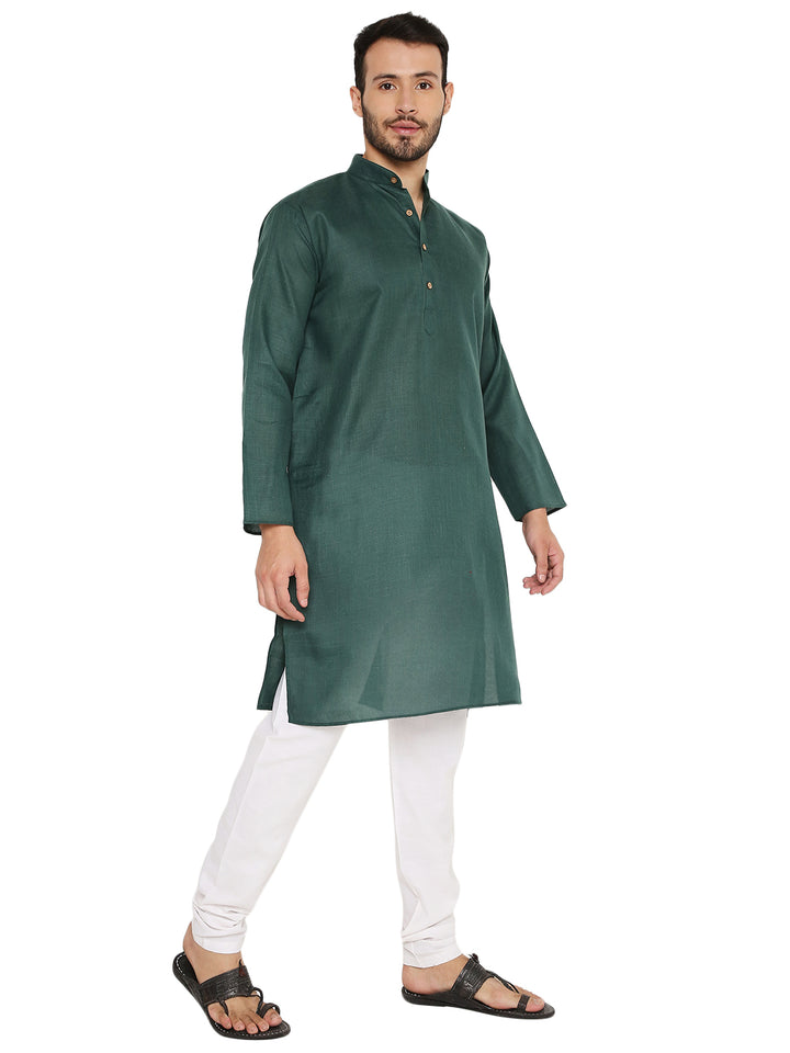 Men's green Magic Cotton Kurta with buttoned placket and mandarin collar, paired with white bottoms for a classic ethnic look.