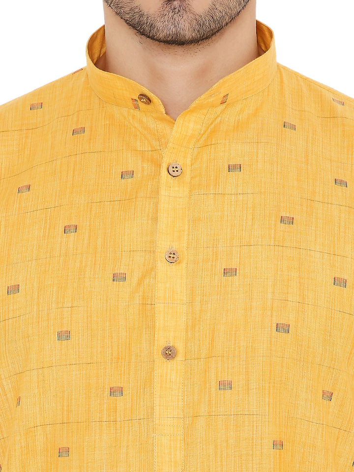 Close-up of Yellow Linen Blend Kurta by Maharaja shows wooden buttons and textured fabric, emphasizing craftsmanship and easy-care material.
