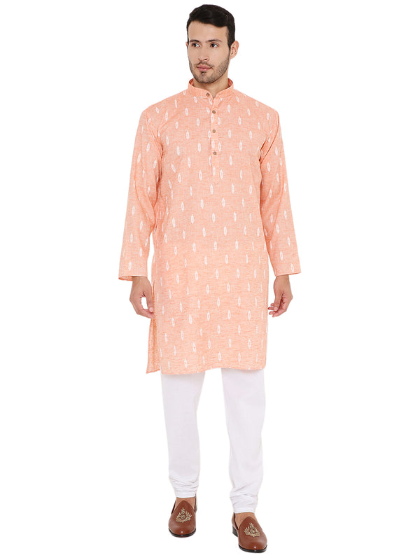 Linen Kurta in orange with white ikat pattern, ideal for summer wear. Features a straight fit and paired with white churidar pants.