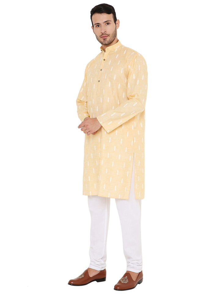 Side pose of yellow linen kurta set with mandarin collar and wooden buttons, perfect for traditional summer occasions.