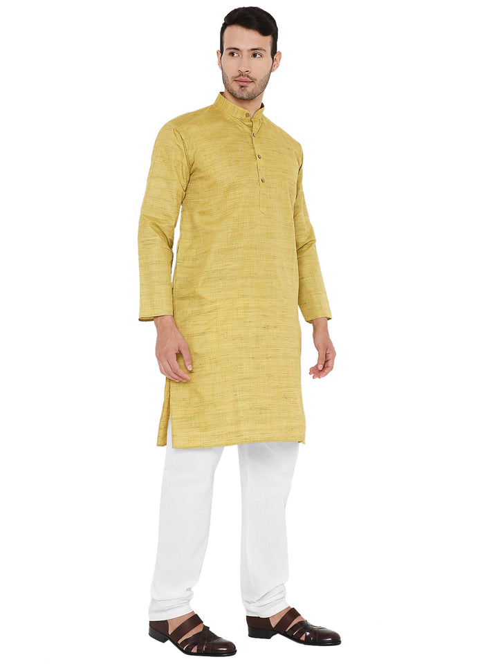 Angled view of Green Silk Kurta - Raw Silk for Festivals, highlighting its elegant texture and festive-ready silhouette.
