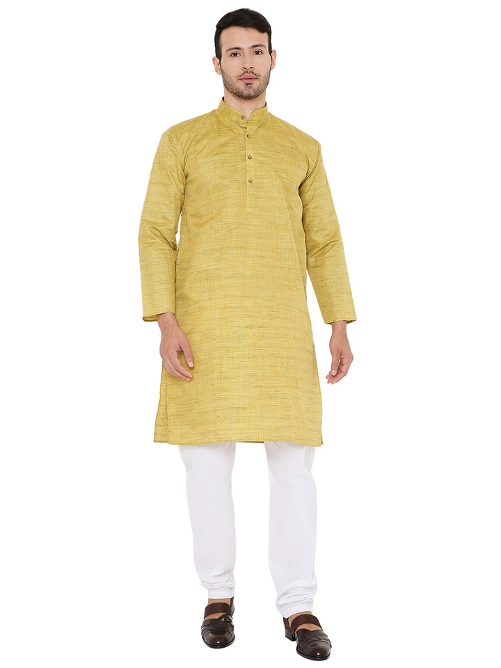 Front view of Green Silk Kurta - Raw Silk for Festivals, paired with white pants, perfect for traditional and ceremonial occasions.