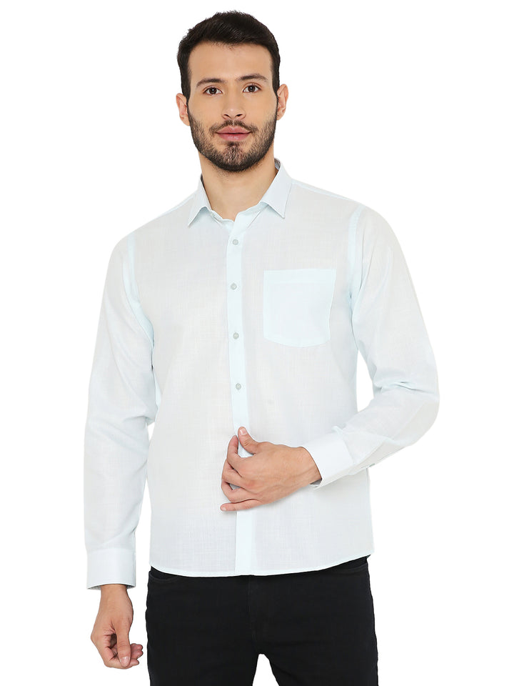 Slim Fit Shirt in pastel blue with long sleeves and front pocket, styled for comfort and elegance in men's casual wear.