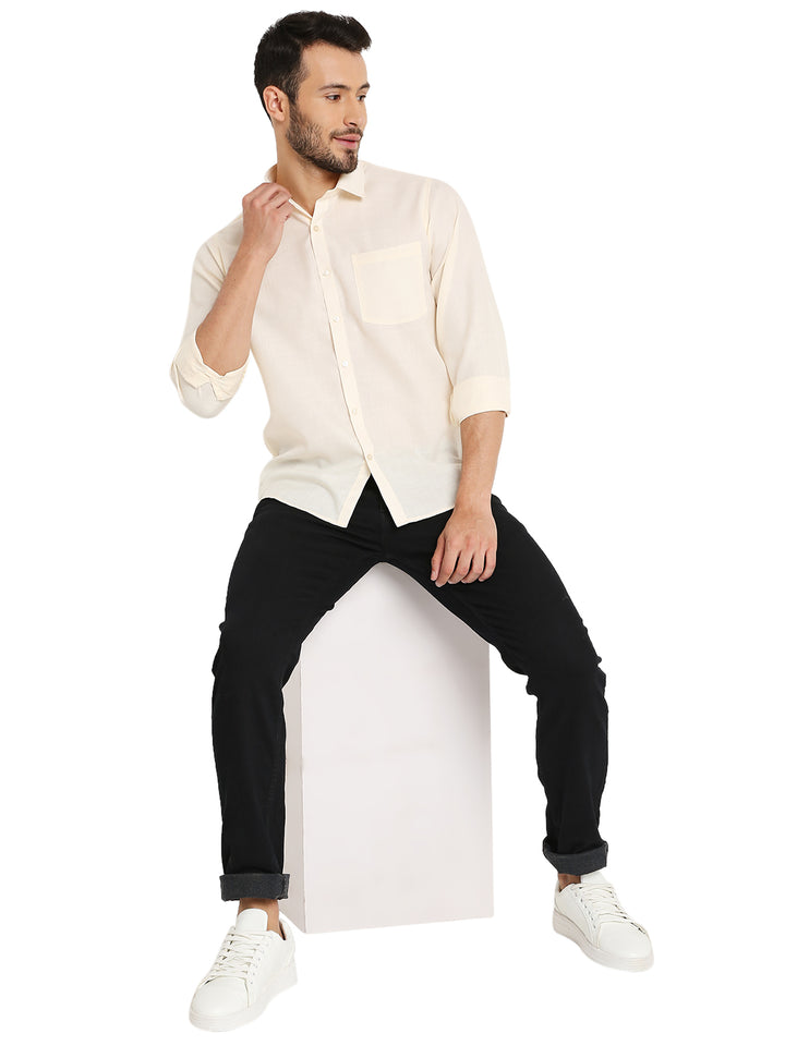 Model wearing Maharaja Peach Shirt - Slim Fit paired with black jeans, demonstrating casual elegance and comfort in men's apparel.