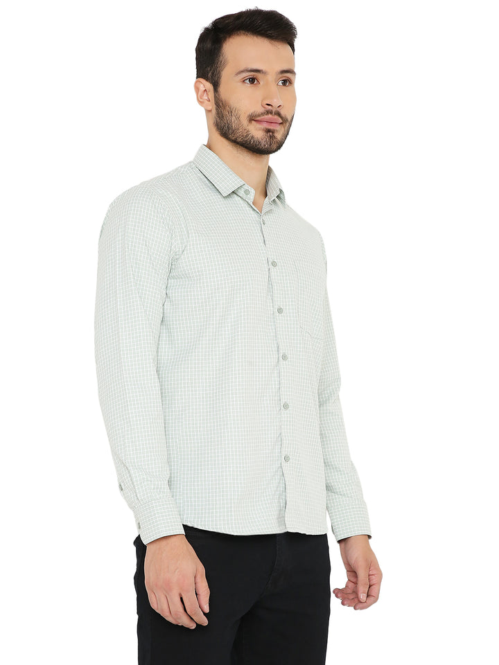 Angled front view of green slim fit shirt with small checks, highlighting its modern cut and easy-care design for daily wear.