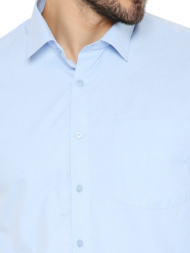 Close-up of Slim Fit Blue Shirt’s collar and chest pocket, emphasizing fine stitching and premium fabric from Maharaja Collection.
